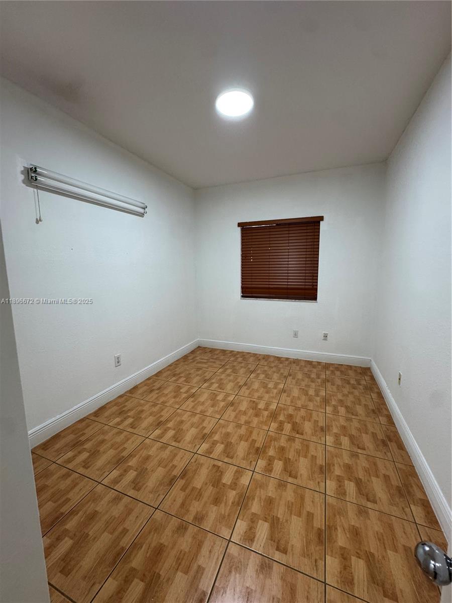 7667 Northwest 182nd Lane, Unit 805 Hialeah, FL 33015 - Photo 8 of 14 a view of an empty room