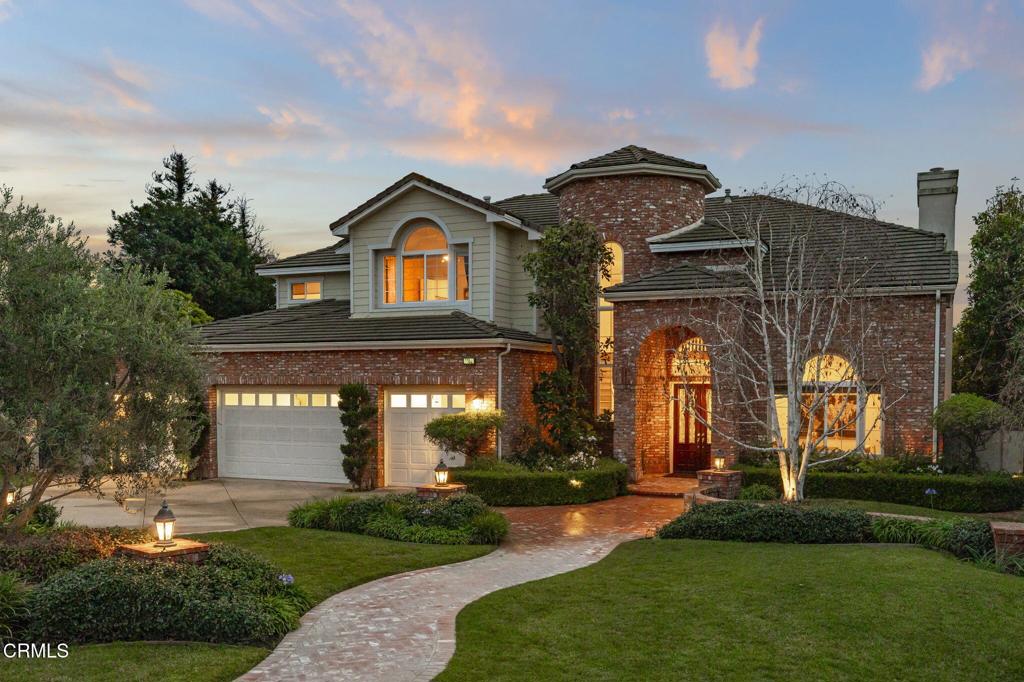 5352 Plata Rosa Court Camarillo, CA 93012 - Photo 1 of 75 a front view of a house with a yard