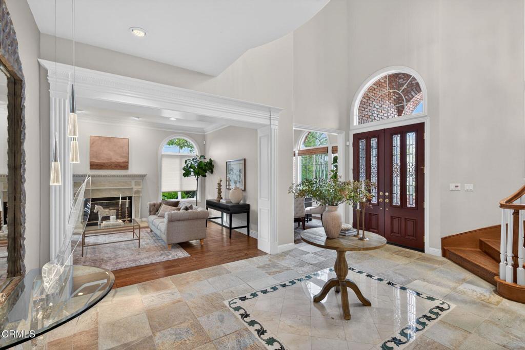5352 Plata Rosa Court Camarillo, CA 93012 - Photo 15 of 75 a living room with furniture a fireplace and potted plants