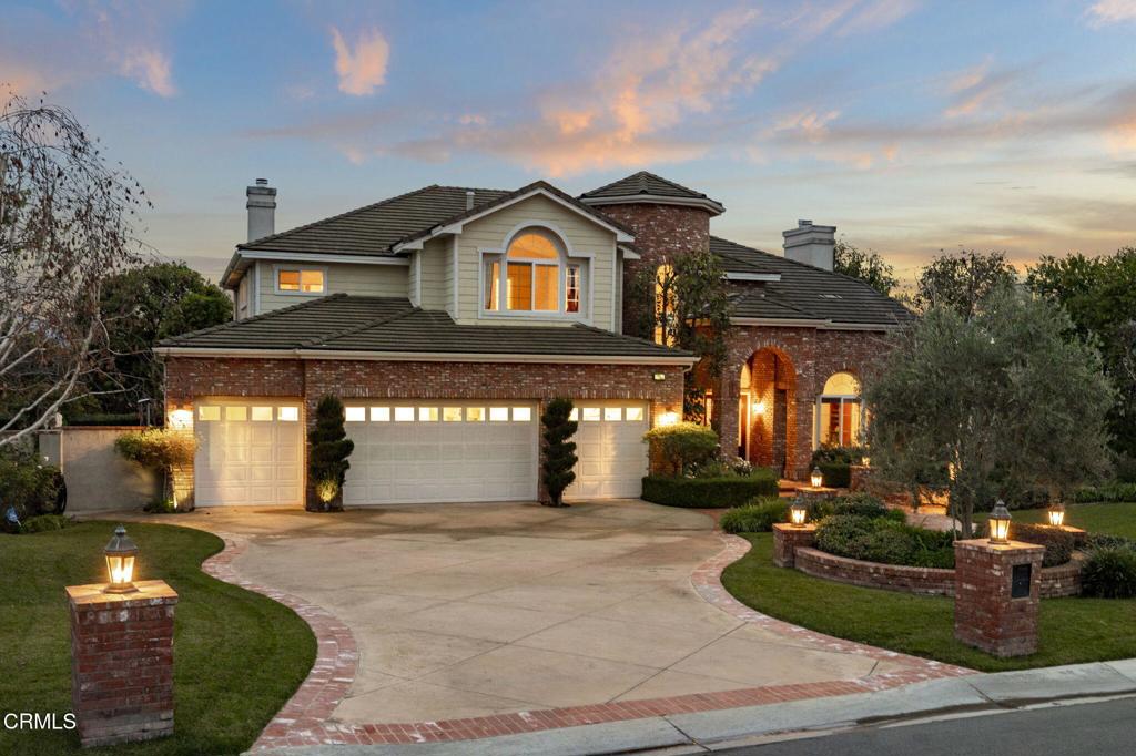 5352 Plata Rosa Court Camarillo, CA 93012 - Photo 2 of 75 a front view of a house with a yard