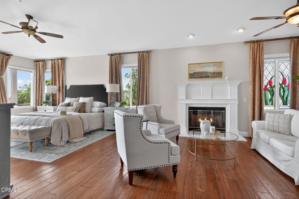 5352 Plata Rosa Court Camarillo, CA 93012 - Photo 33 of 75 a living room with furniture fireplace and a large window