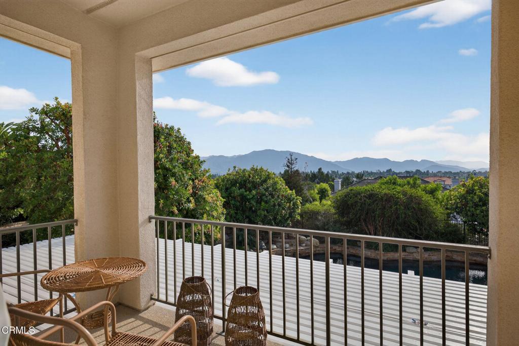 5352 Plata Rosa Court Camarillo, CA 93012 - Photo 46 of 75 a view of a balcony with chair and wooden floor