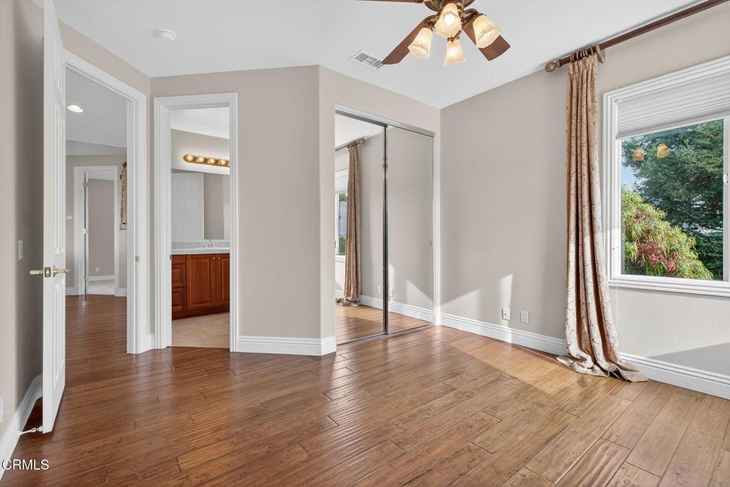 5352 Plata Rosa Court Camarillo, CA 93012 - Photo 49 of 75 a view of an empty room with wooden floor and a window