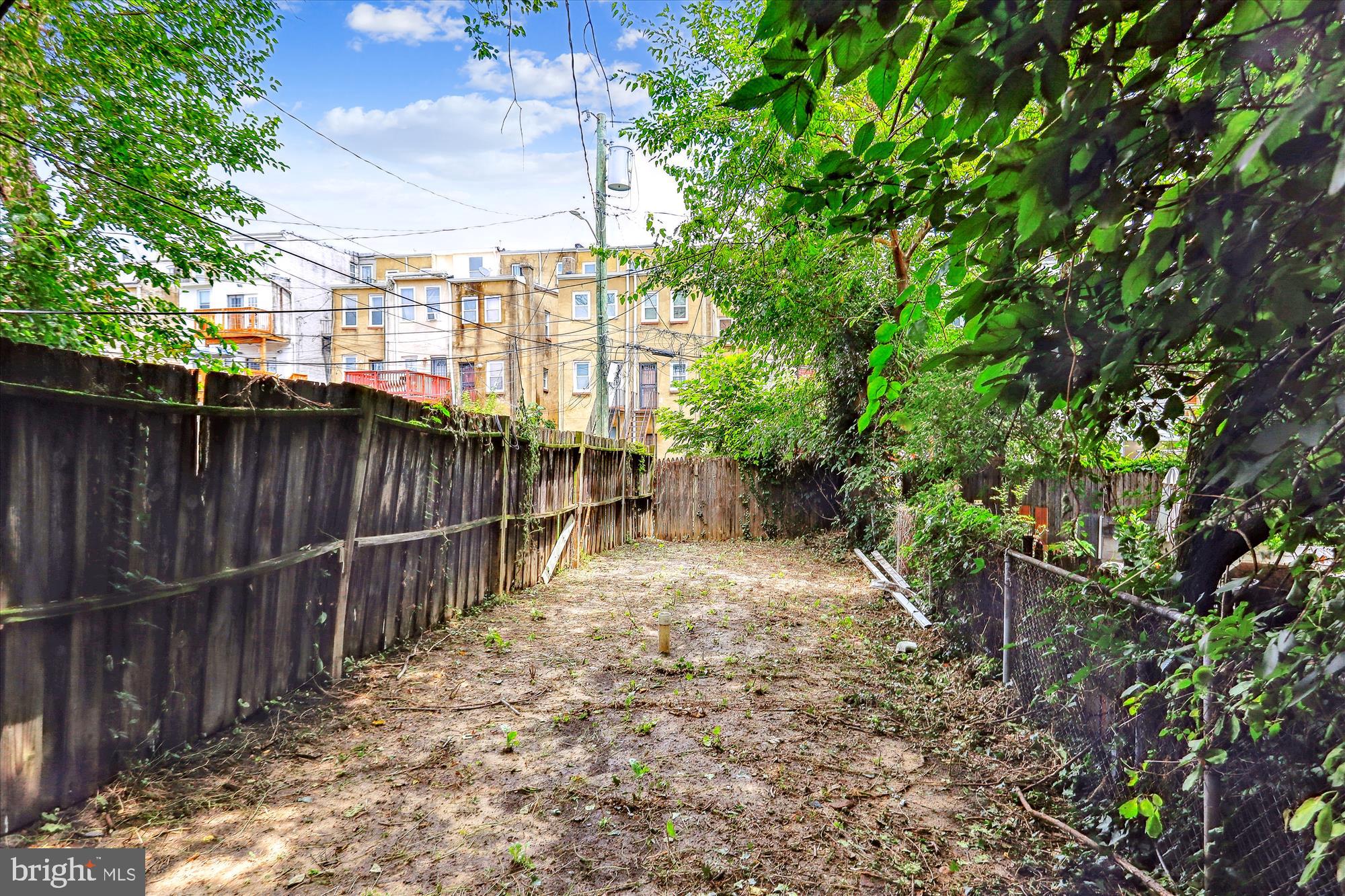 2315 McCulloh Street Baltimore, MD 21217 - Photo 36 of 40 a view of a pathway with a wooden fence