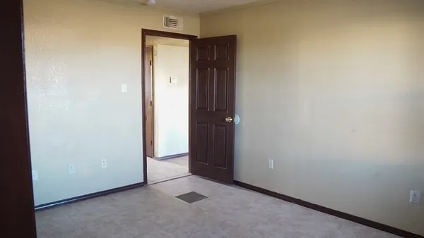 an empty room with closet