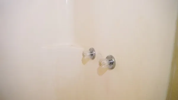 a close view of shower tap