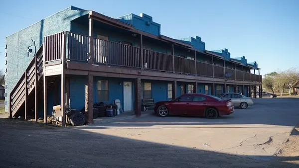 a front view of a building with street