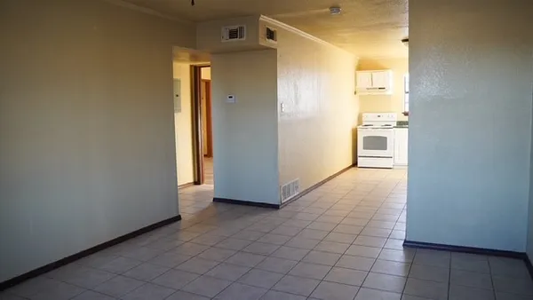 a view of a hallway with a white walls