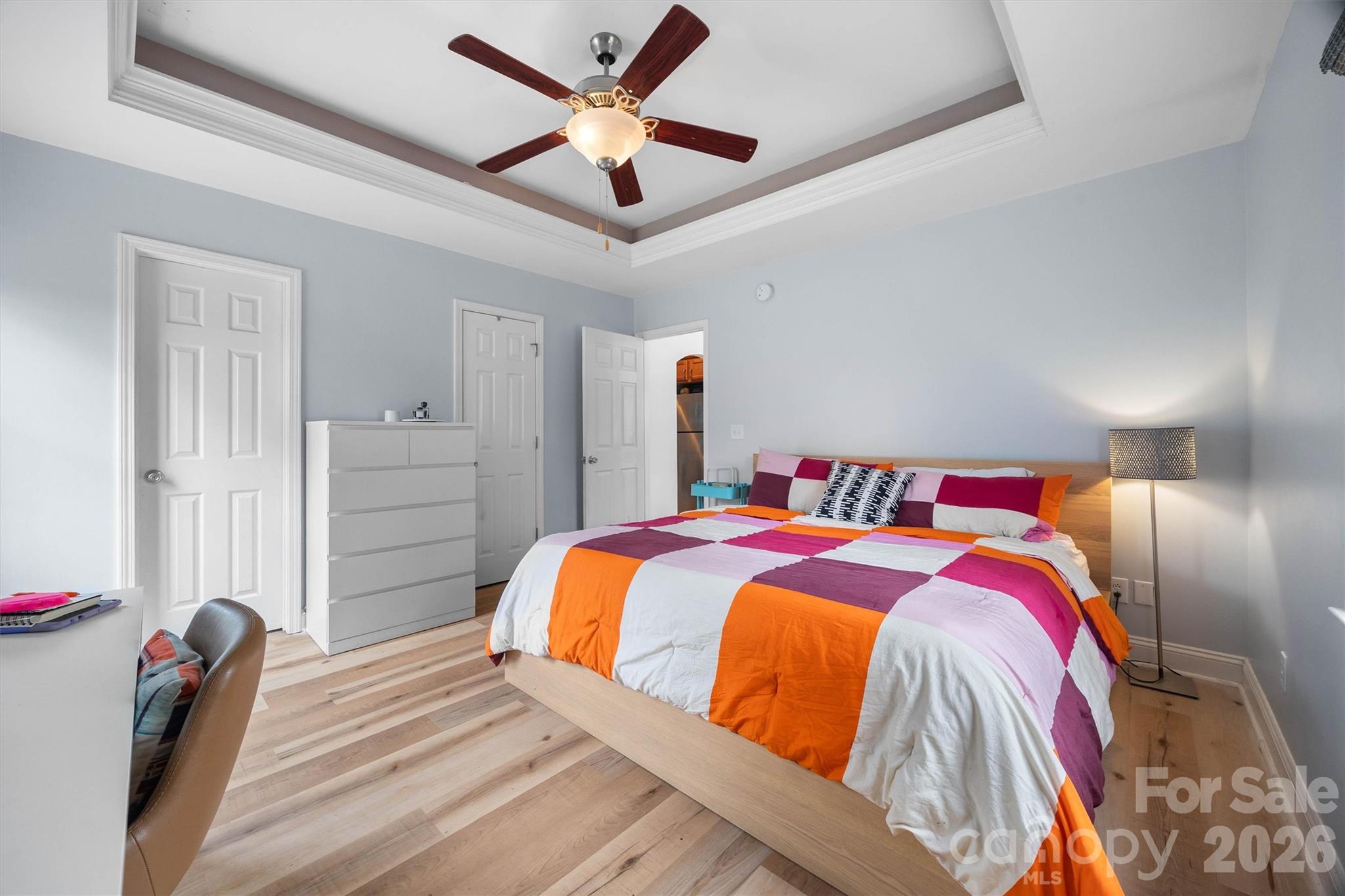 219 Nottingham Street York, SC 29745 - Photo 22 of 38 a bedroom with a bed and a chandelier