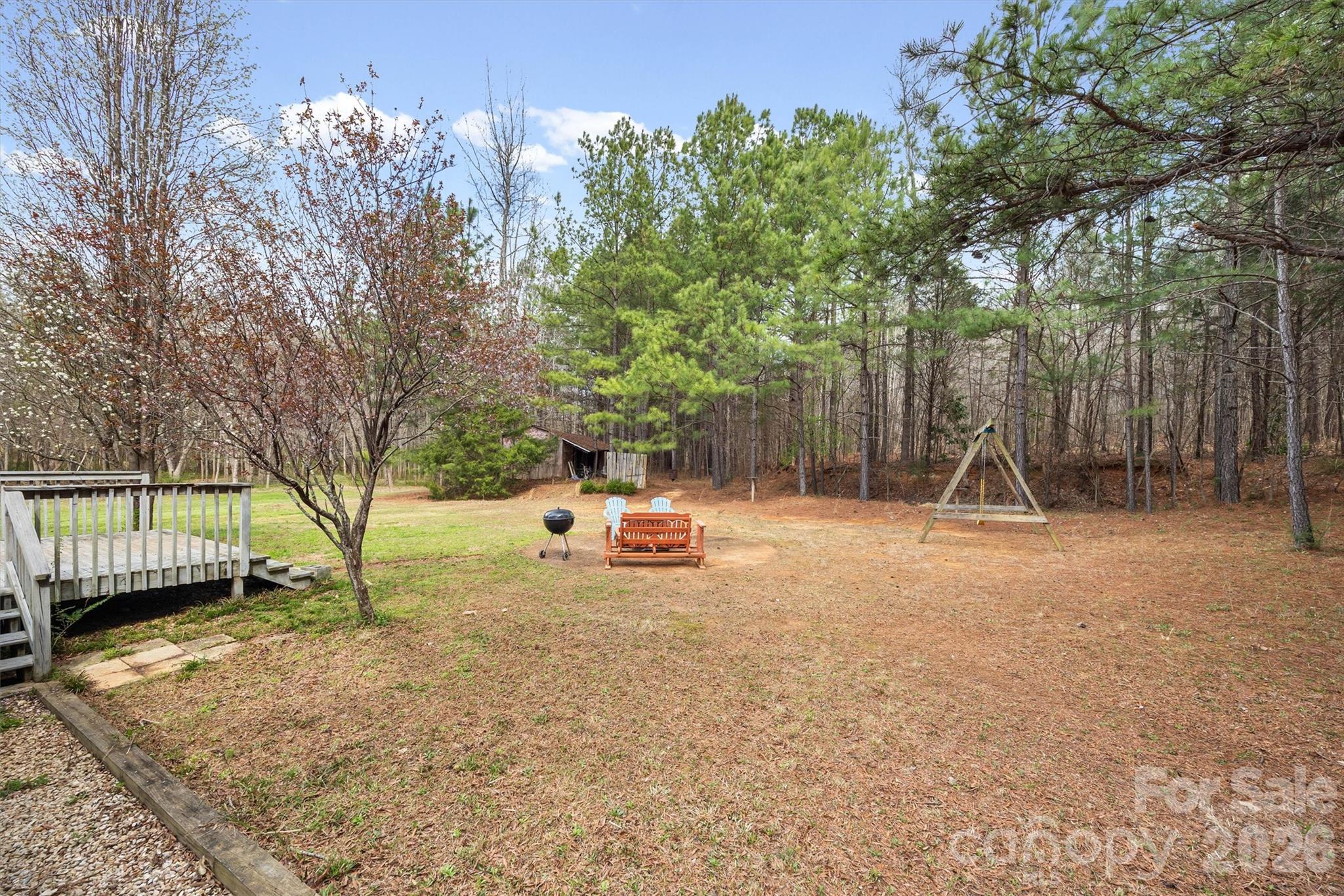 219 Nottingham Street York, SC 29745 - Photo 25 of 38 a view of backyard with a slide