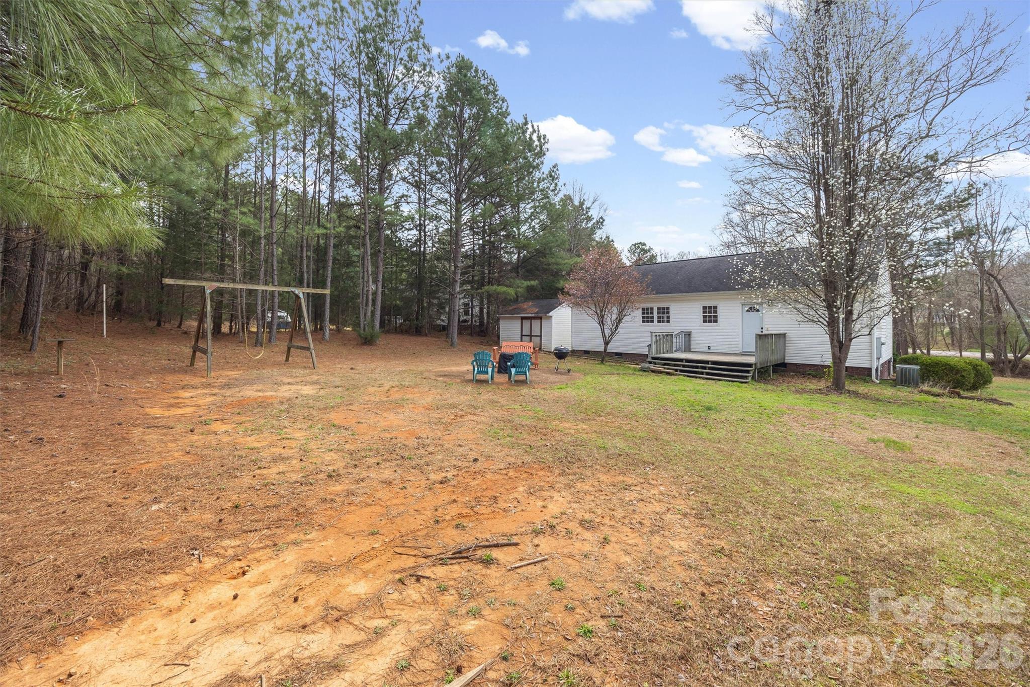 219 Nottingham Street York, SC 29745 - Photo 26 of 38 a view of yard with swimming pool and trees