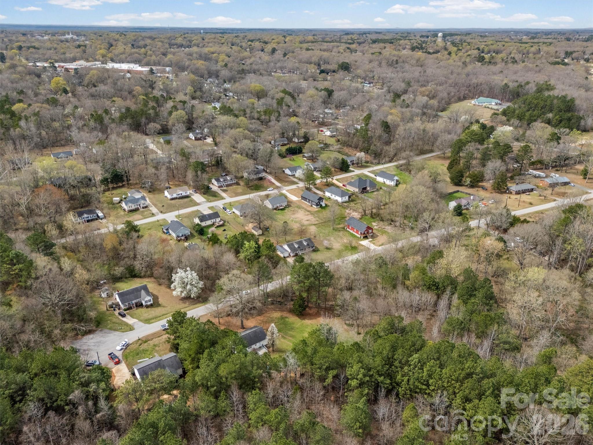 219 Nottingham Street York, SC 29745 - Photo 33 of 38 an aerial view of house with yard and mountain view in back
