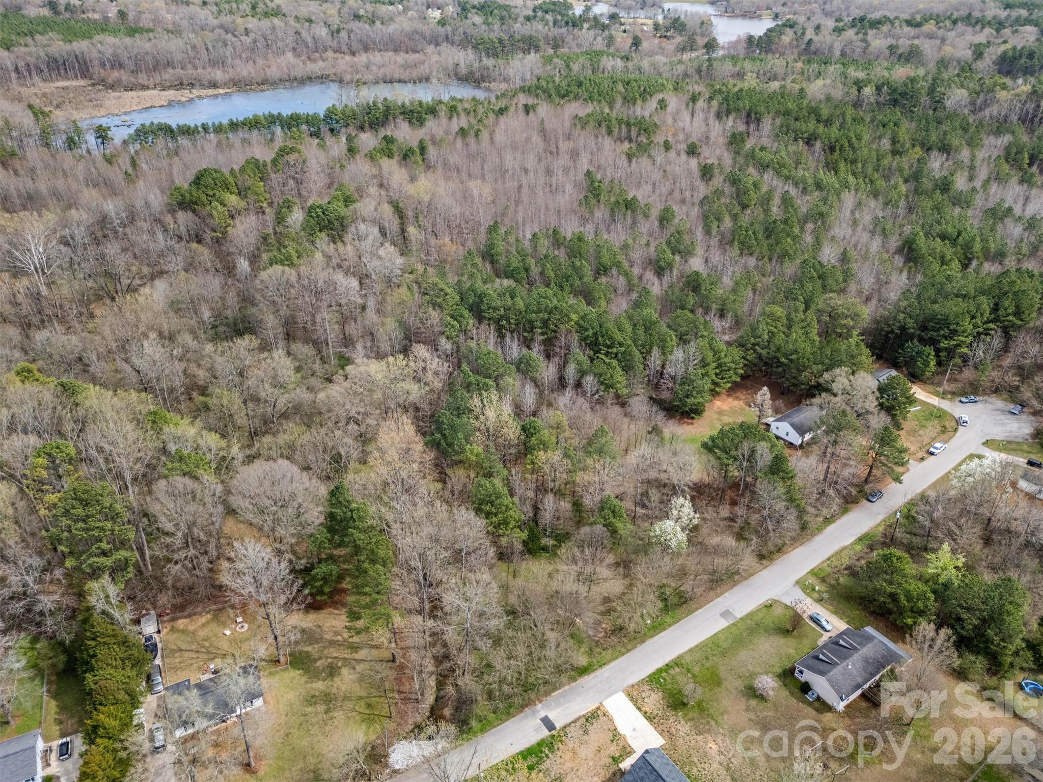 219 Nottingham Street York, SC 29745 - Photo 37 of 38 a view of a yard with a wooden fence