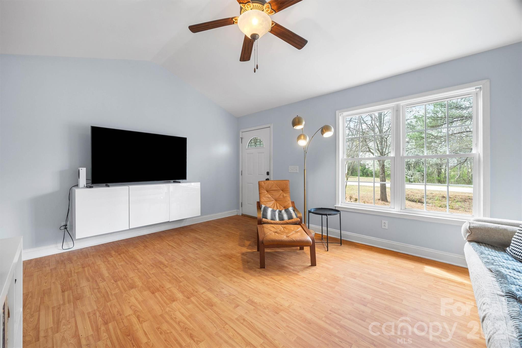 219 Nottingham Street York, SC 29745 - Photo 6 of 38 a living room with furniture and a flat screen tv