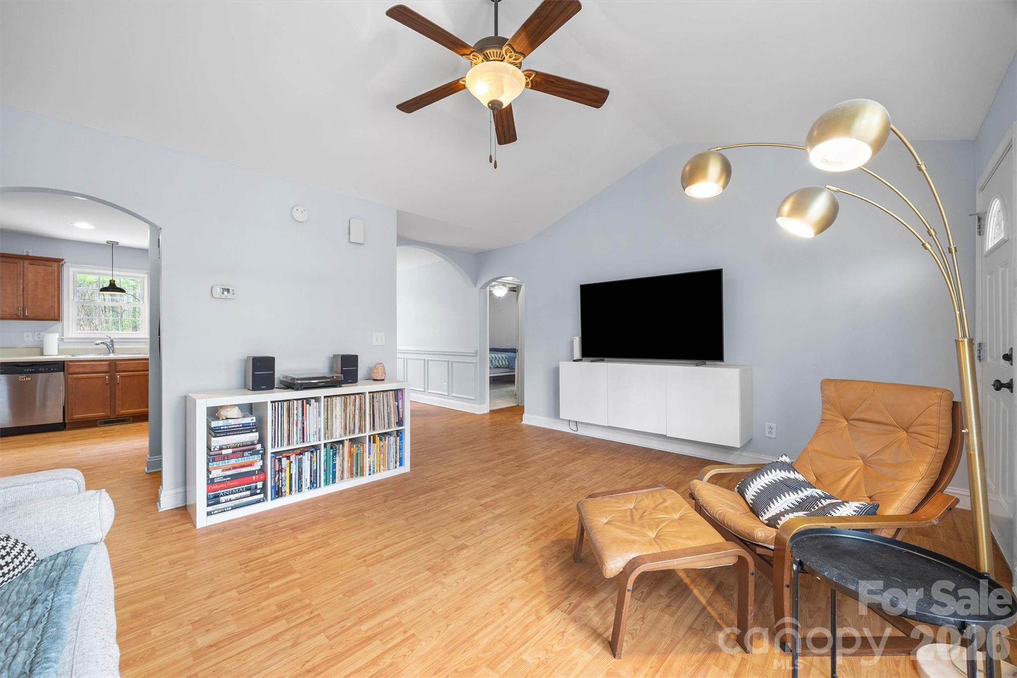 219 Nottingham Street York, SC 29745 - Photo 7 of 38 a living room with furniture and a flat screen tv