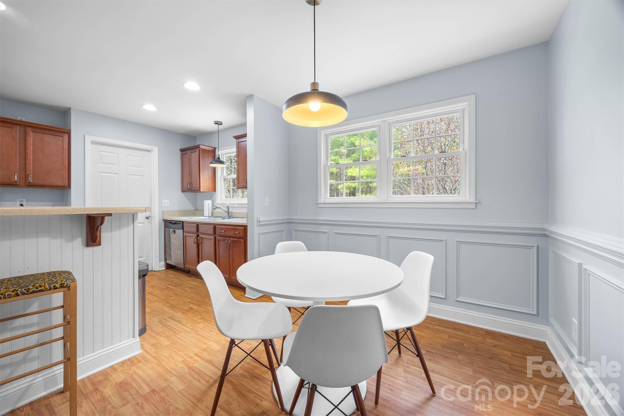 219 Nottingham Street York, SC 29745 - Photo 8 of 38 a view of a dining room with furniture and a chandelier