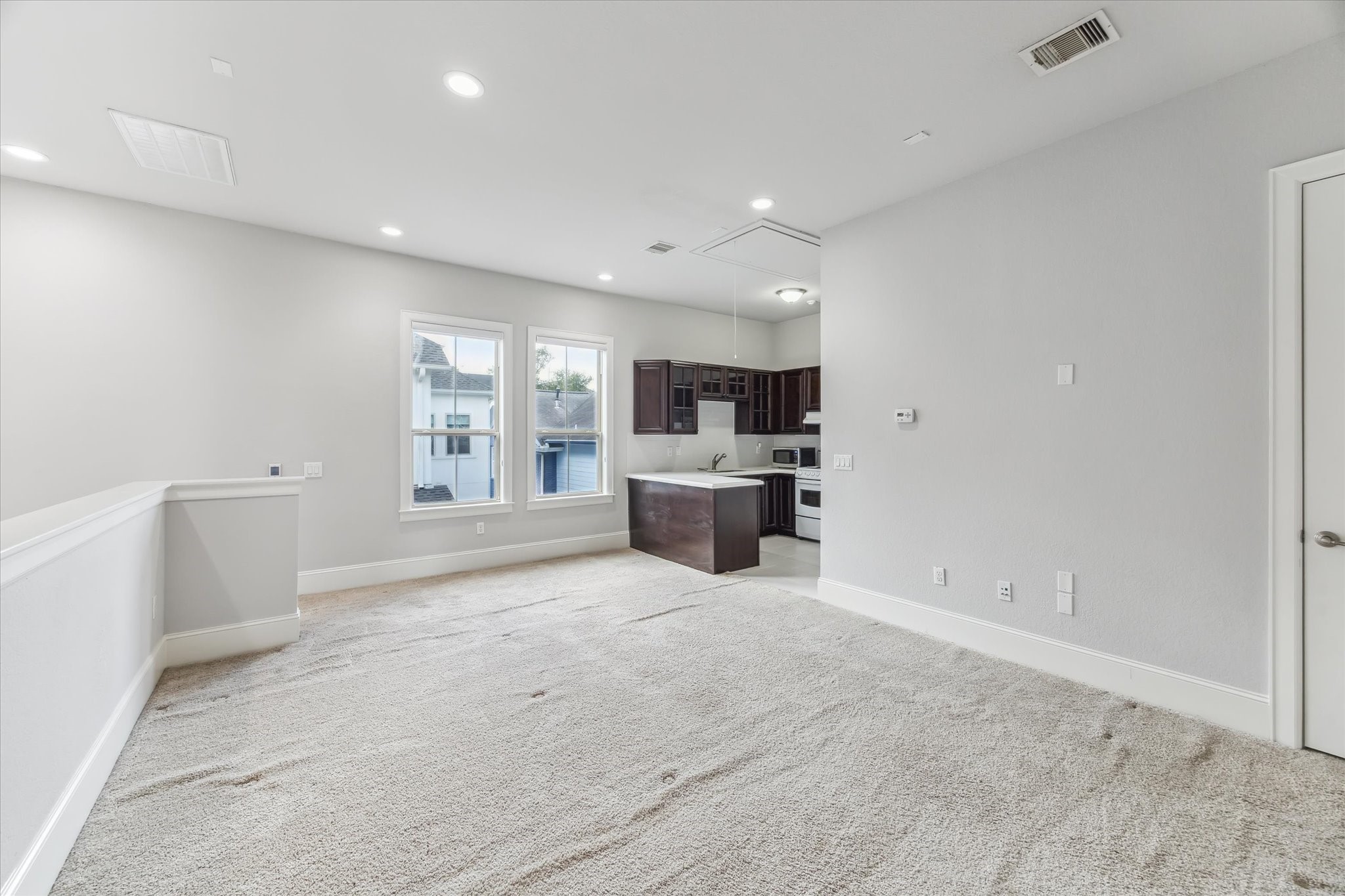 1721 Colquitt Street Houston, TX 77098 - Photo 29 of 30 a large white kitchen with a large window