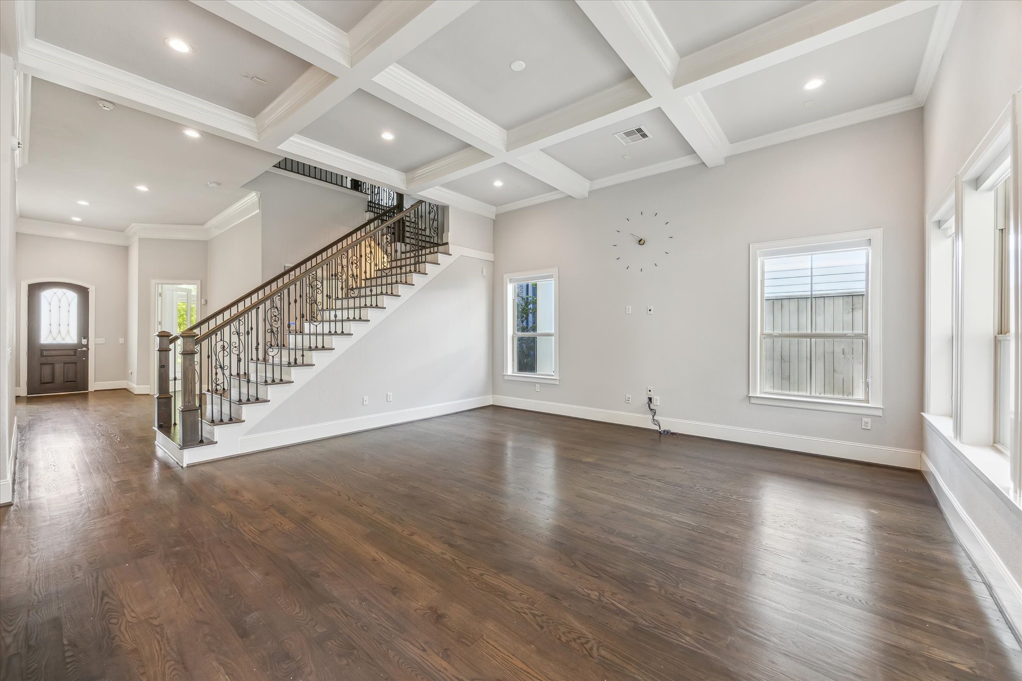 1721 Colquitt Street Houston, TX 77098 - Photo 7 of 30 an empty room with wooden floor and windows