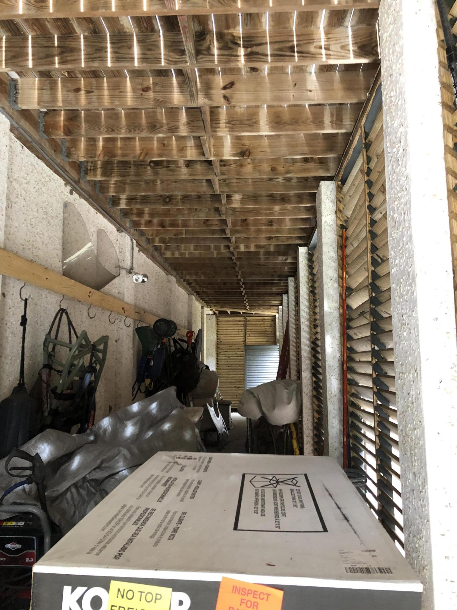 1117 Galleon Road Charleston, SC 29412 - Photo 25 of 33 storage room under front porch