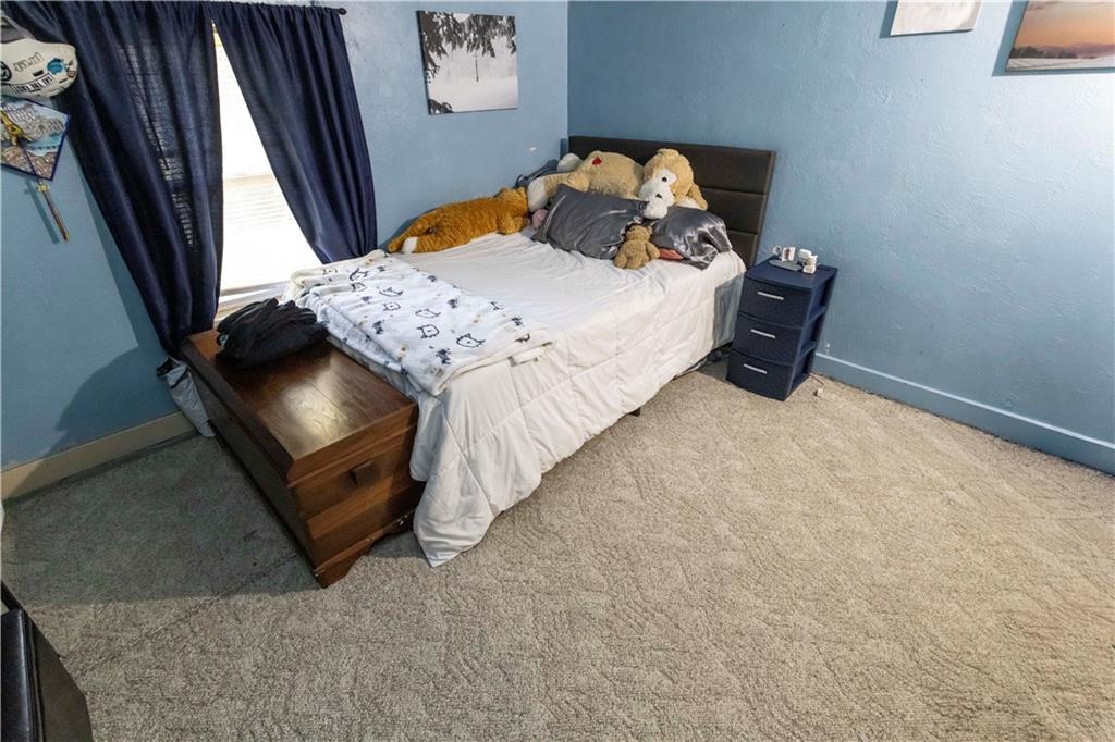 842 Anderson Street Confluence, PA 15424 - Photo 22 of 43 a bedroom with a bed and window