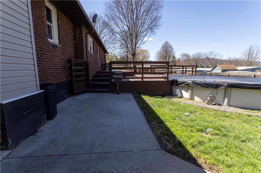 842 Anderson Street Confluence, PA 15424 - Photo 31 of 43 a view of a swimming pool with a yard
