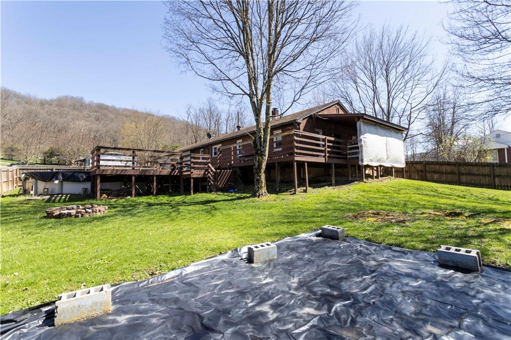842 Anderson Street Confluence, PA 15424 - Photo 32 of 43 a backyard of a house with lots of green space