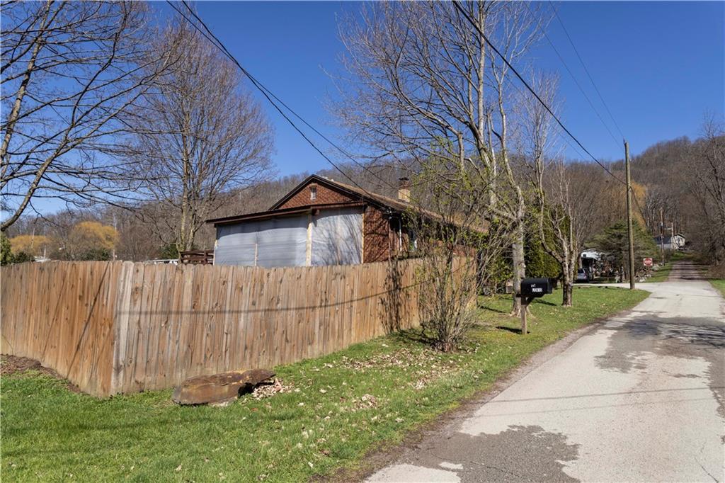 842 Anderson Street Confluence, PA 15424 - Photo 33 of 43 a view of backyard with large trees
