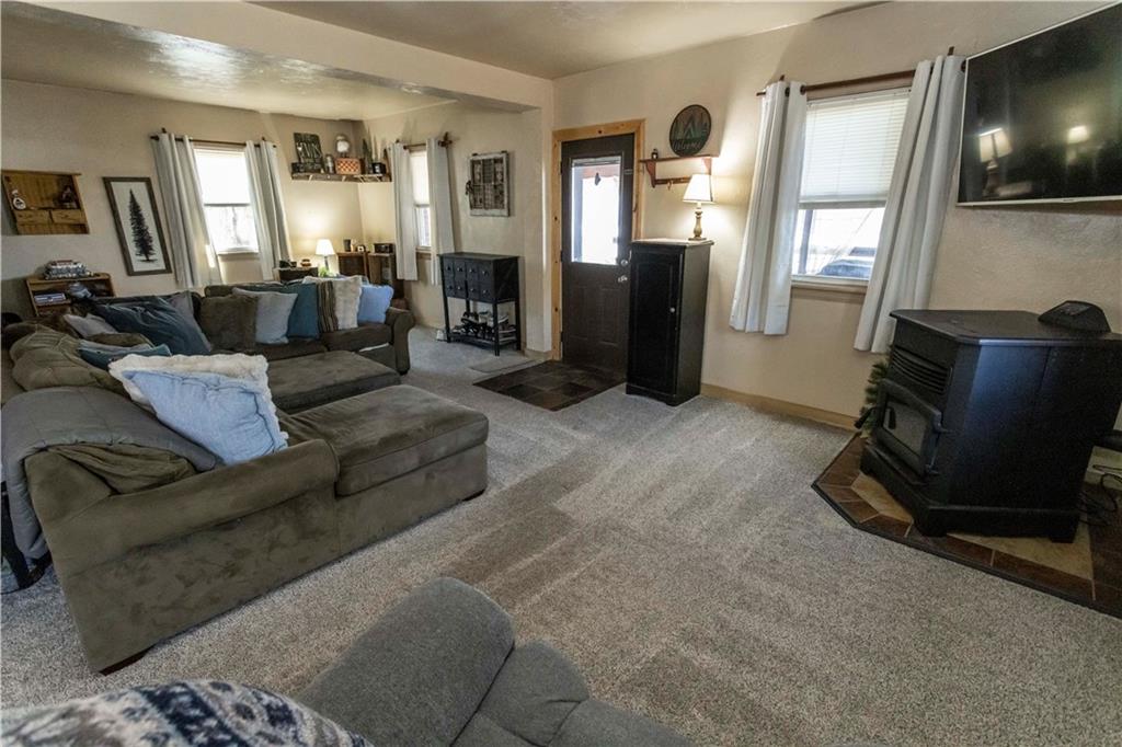 842 Anderson Street Confluence, PA 15424 - Photo 8 of 43 a living room with furniture and a flat screen tv