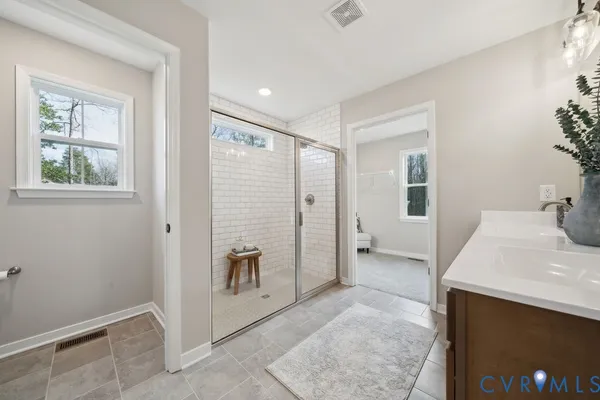 a small bedroom with a window