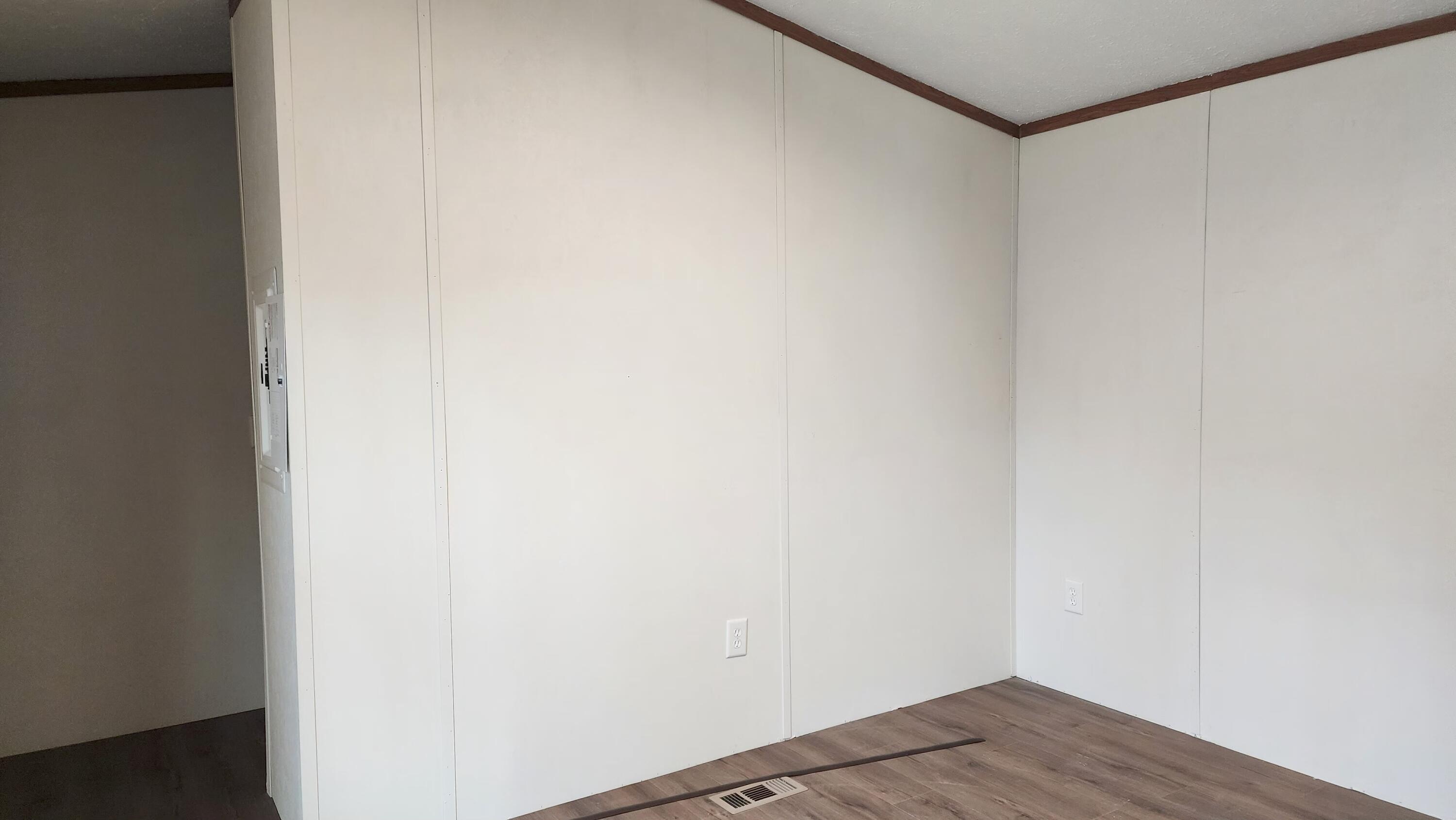 154 Staples Road Newfield, ME 04095 - Photo 6 of 11 Primary bedroom w electric panel