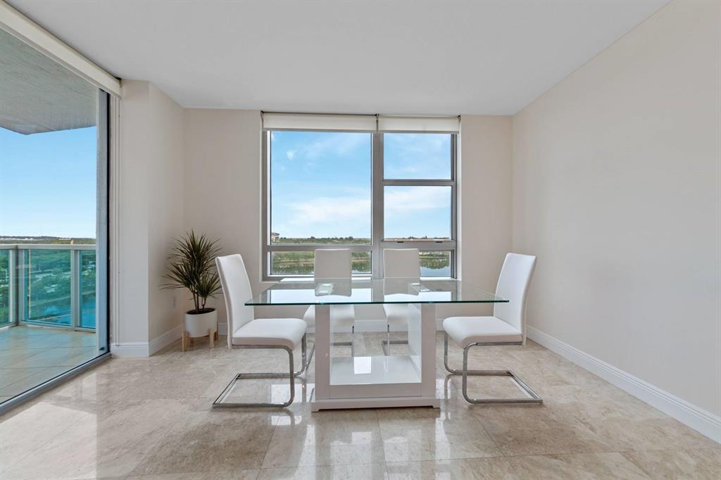 2641 North Flamingo Road Plantation, FL 33323 - Photo 12 of 23 a living room with furniture and a potted plant