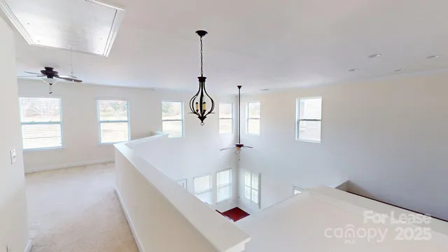 a bathroom with a toilet and a bathtub