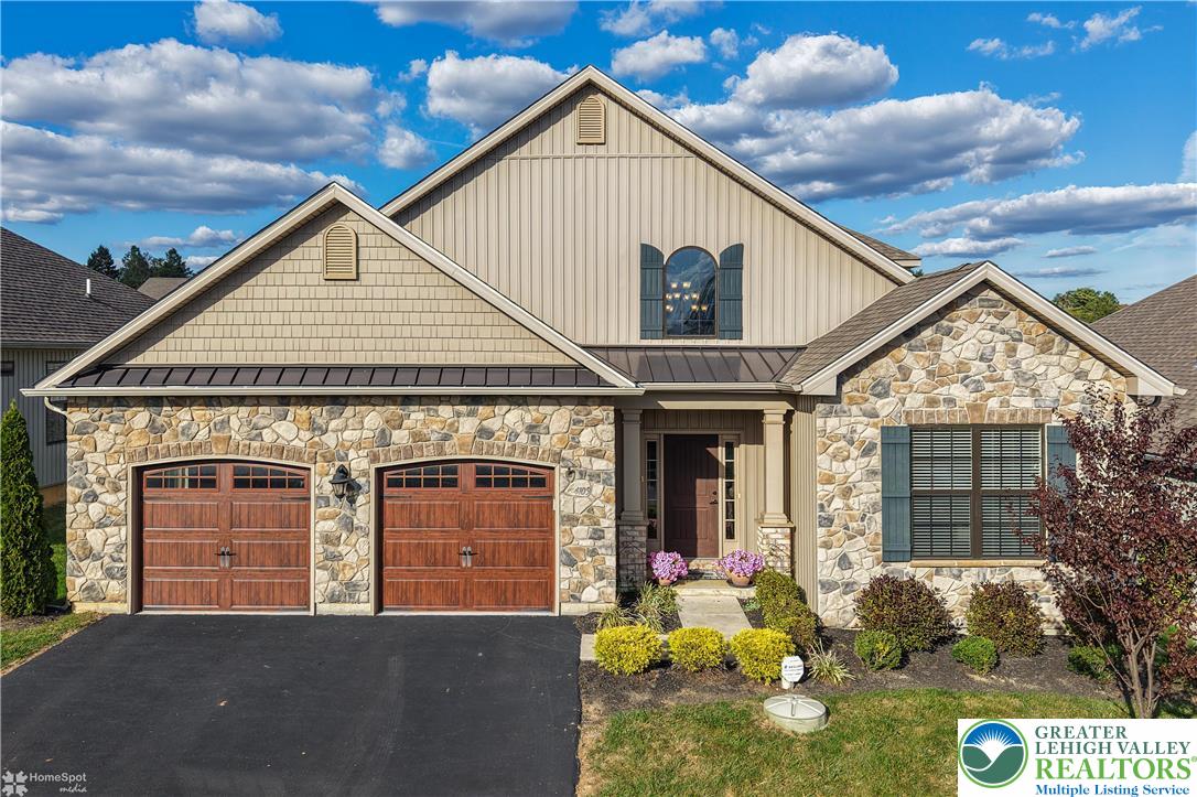 a view of small house with yard
