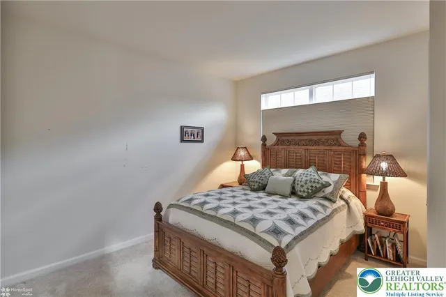 a work room with furniture and a window