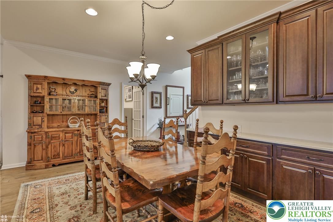 4109 Eveningstar Road Emmaus, PA 18049 - Photo 19 of 57 a view of a dining room with furniture and chandelier