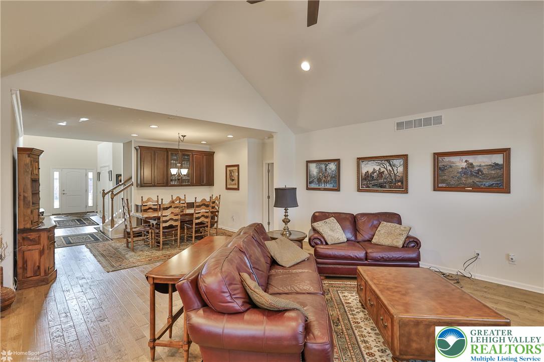 4109 Eveningstar Road Emmaus, PA 18049 - Photo 23 of 57 a living room with furniture and a flat screen tv