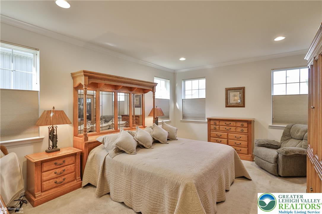 4109 Eveningstar Road Emmaus, PA 18049 - Photo 31 of 57 a bedroom with bed and wooden floor