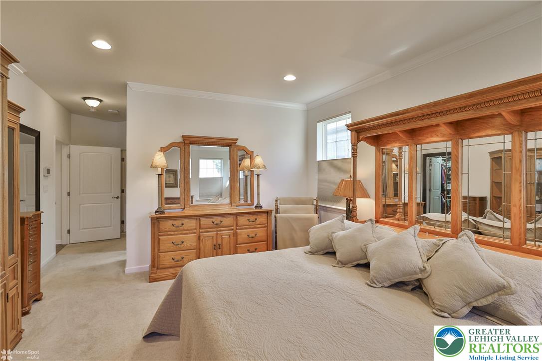 4109 Eveningstar Road Emmaus, PA 18049 - Photo 32 of 57 a bedroom with a bed and a dresser