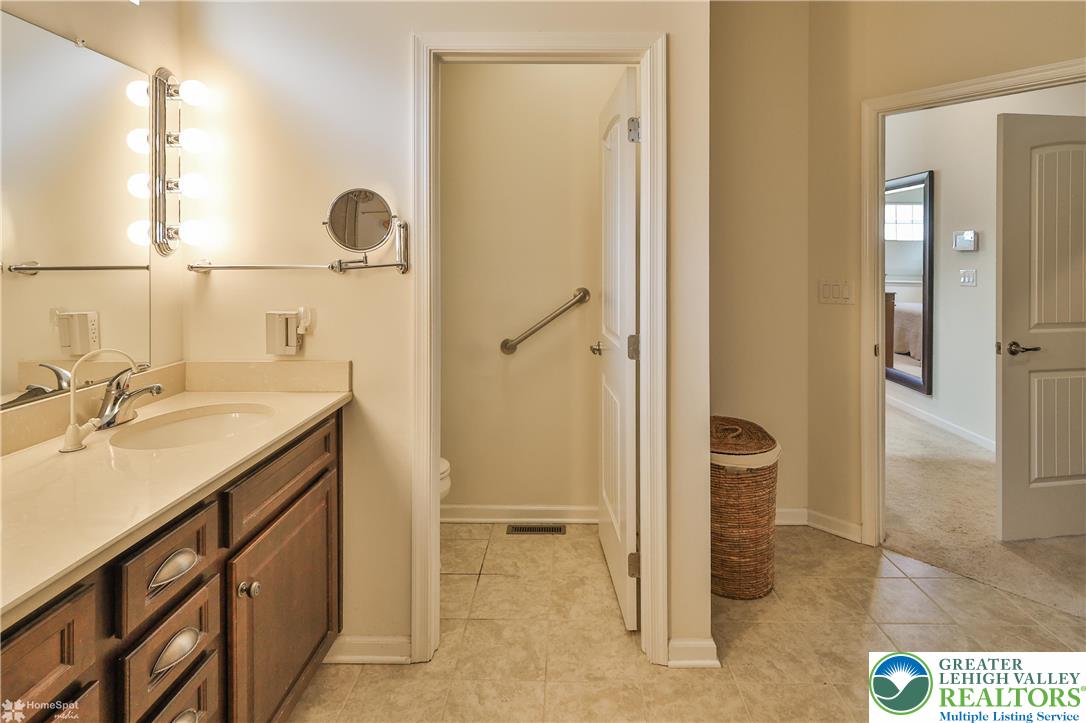 4109 Eveningstar Road Emmaus, PA 18049 - Photo 34 of 57 a bathroom with a sink and a mirror