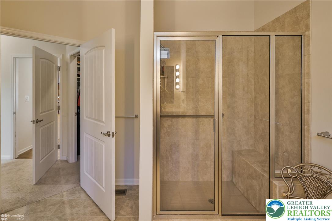 4109 Eveningstar Road Emmaus, PA 18049 - Photo 35 of 57 a bathroom with a shower and a sink