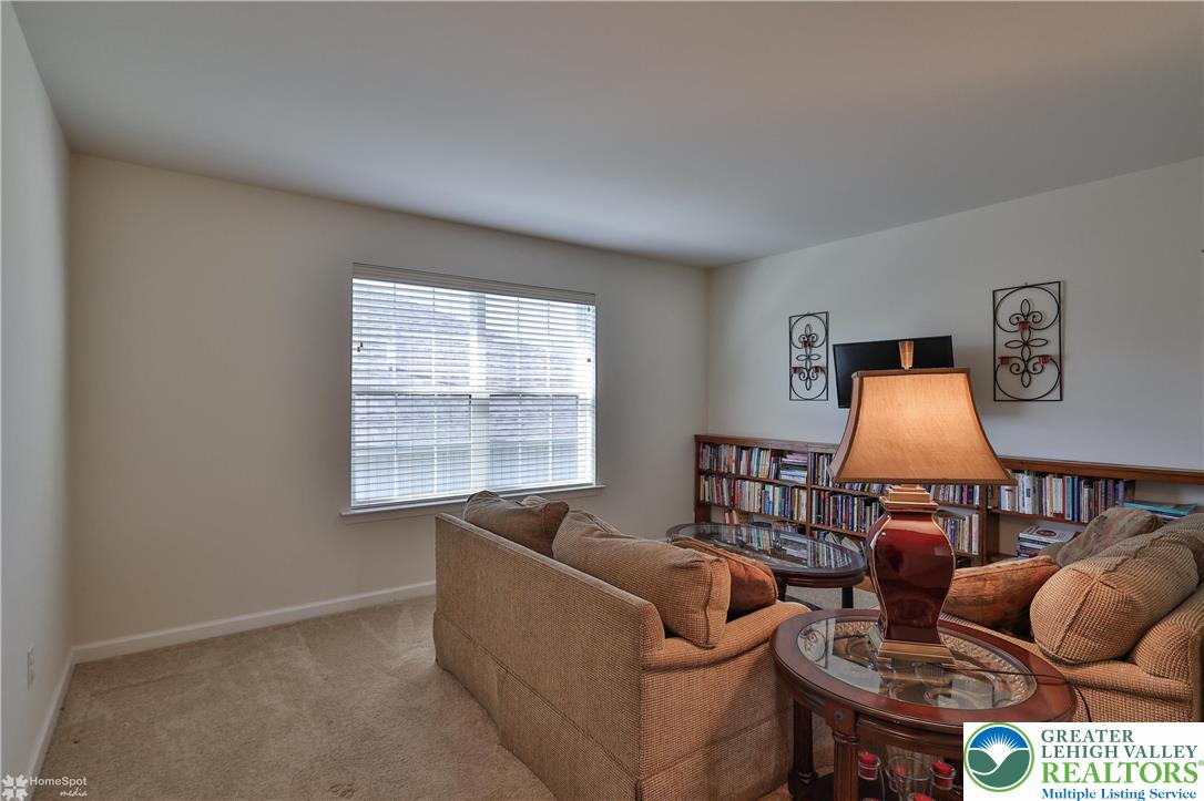 4109 Eveningstar Road Emmaus, PA 18049 - Photo 41 of 57 a living room with furniture and a window