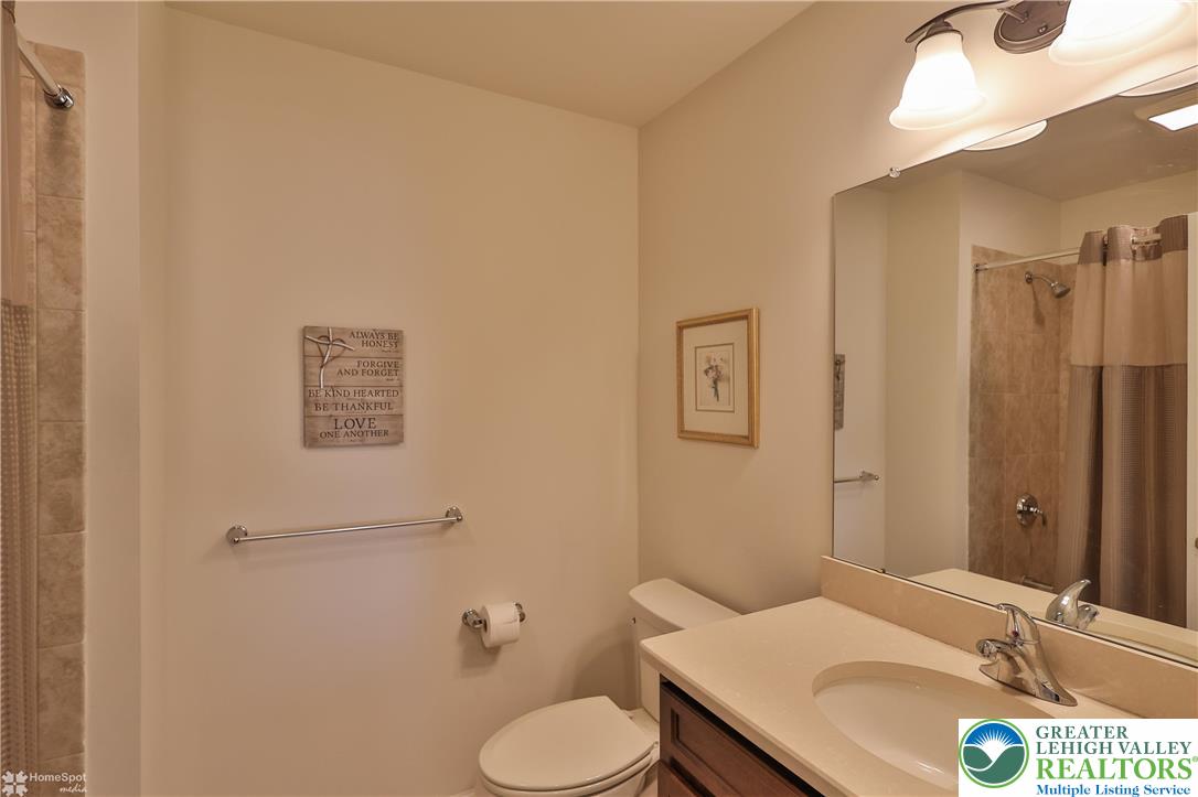 4109 Eveningstar Road Emmaus, PA 18049 - Photo 43 of 57 a bathroom with a sink toilet and mirror