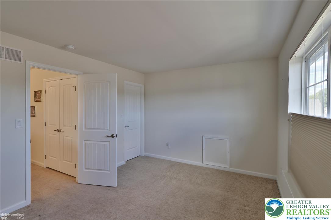 4109 Eveningstar Road Emmaus, PA 18049 - Photo 44 of 57 a view of an empty room with a window