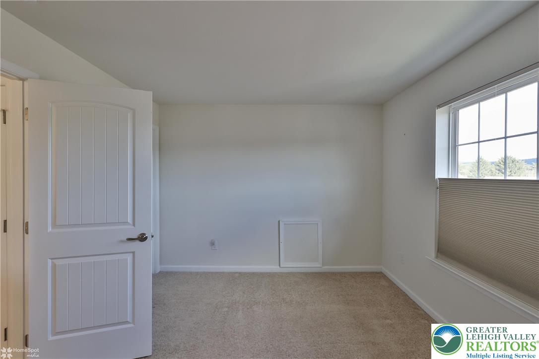 4109 Eveningstar Road Emmaus, PA 18049 - Photo 45 of 57 an empty room with windows
