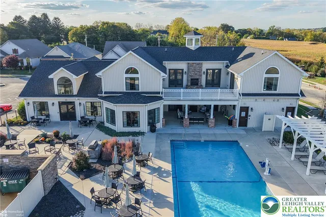 a kitchen with stainless steel appliances a sink and cabinets
