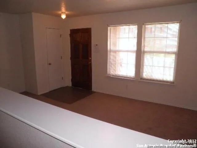 an empty room with a window