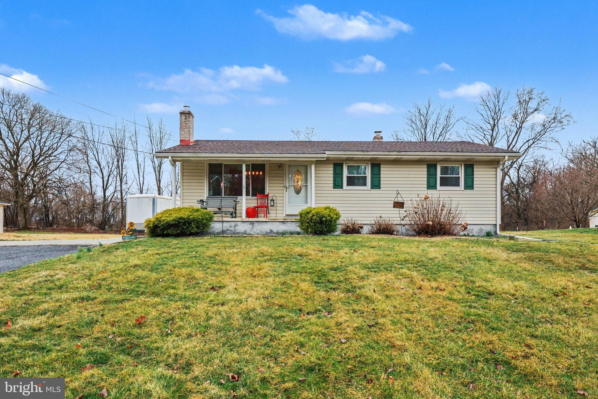 109 Adams Road Carlisle, PA 17015 - Photo 1 of 29 a front view of house with yard and green space