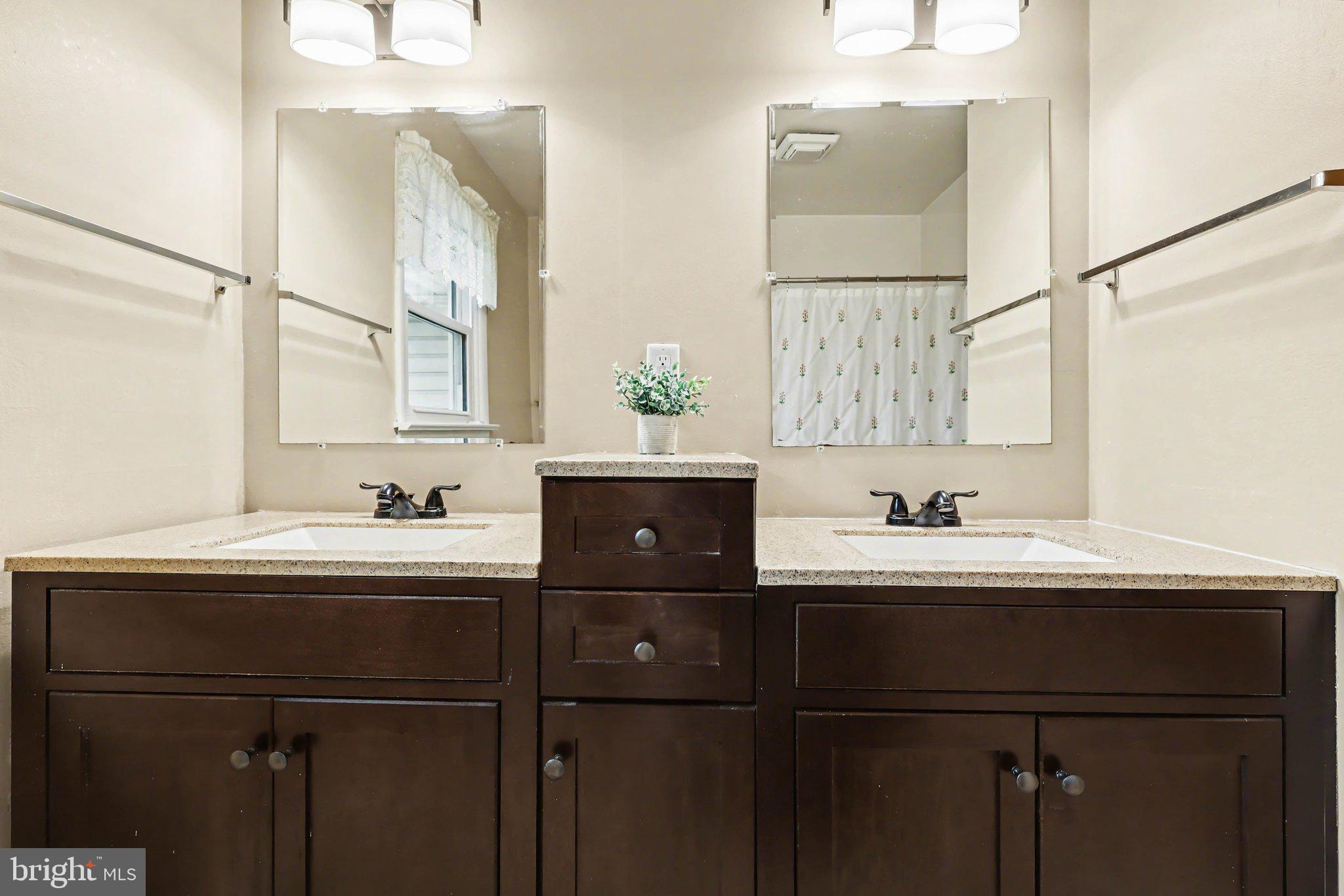 109 Adams Road Carlisle, PA 17015 - Photo 13 of 29 a bathroom with a sink and a mirror