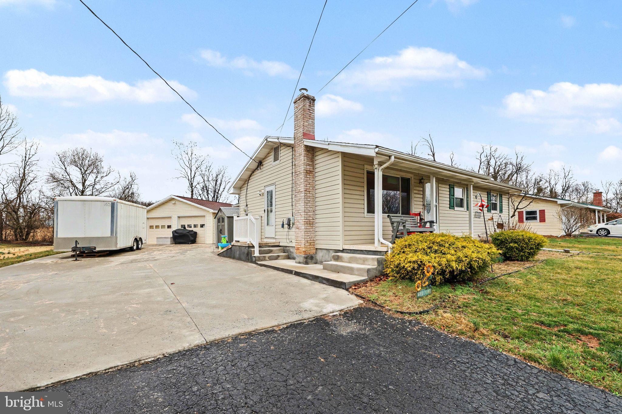 109 Adams Road Carlisle, PA 17015 - Photo 20 of 29 a front view of a house with a yard
