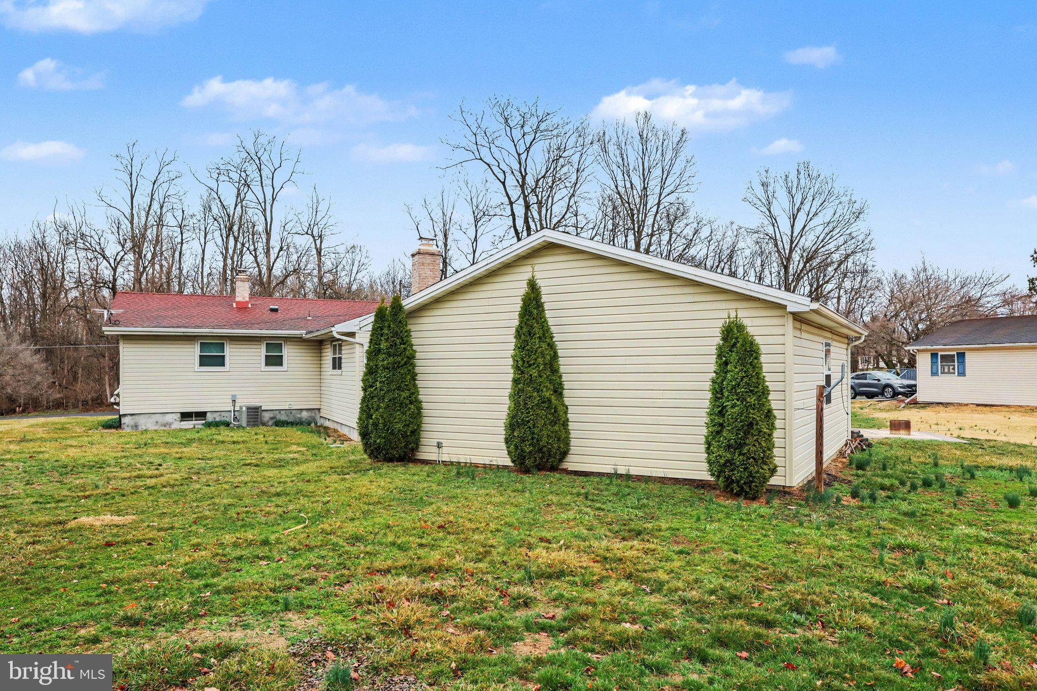 109 Adams Road Carlisle, PA 17015 - Photo 23 of 29 a view of a house with a yard